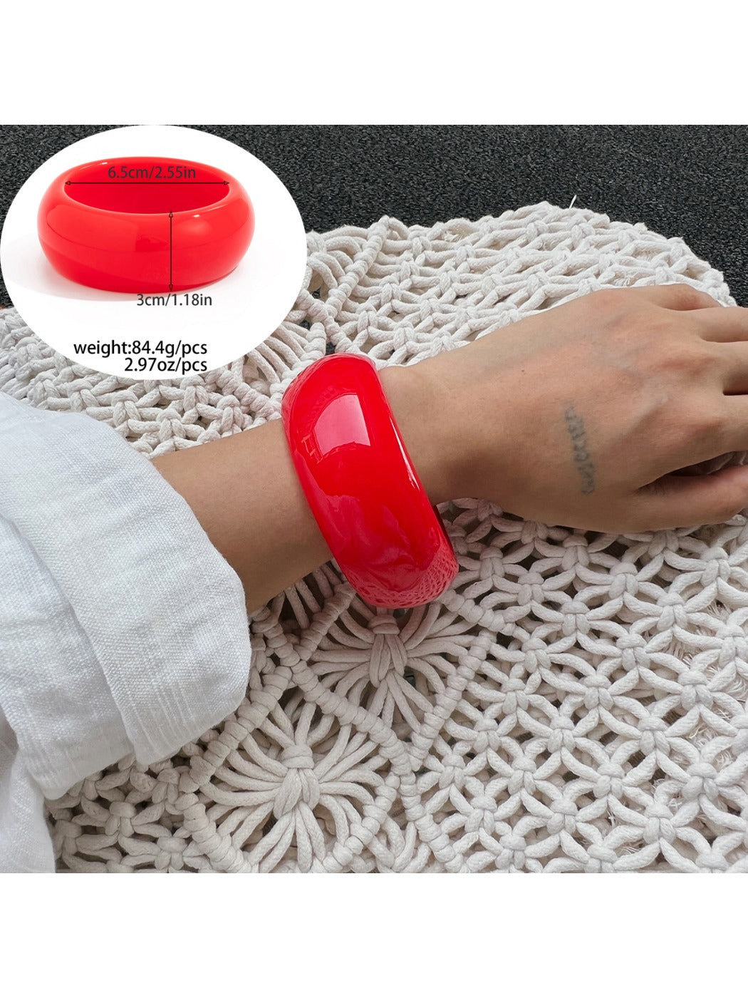 Lovra irregular bangle bracelet displayed on a jewelry stand