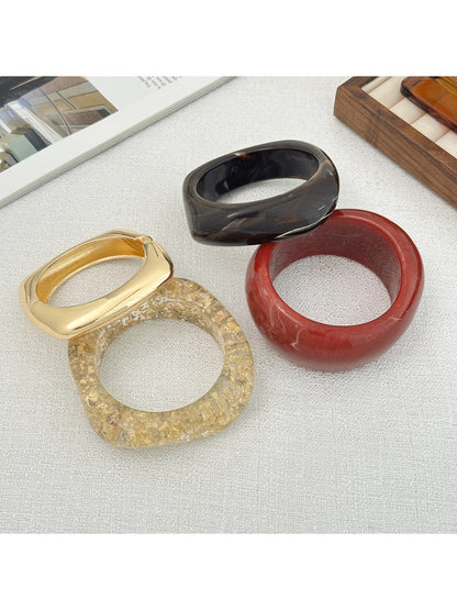Close-up of Lovra vintage wide irregular shaped bangle bracelet showing texture