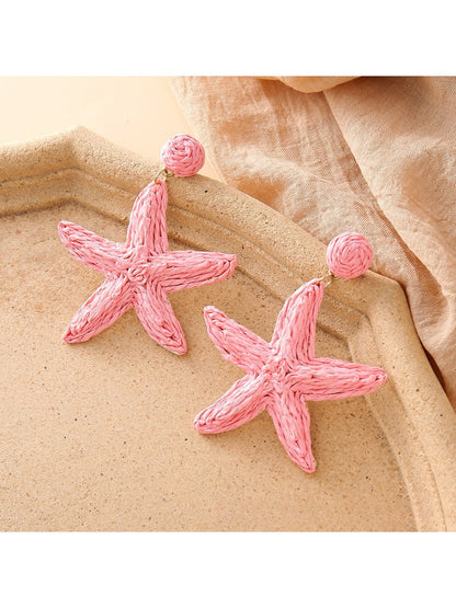 Earedge starfish drop earrings shown from front and side angles