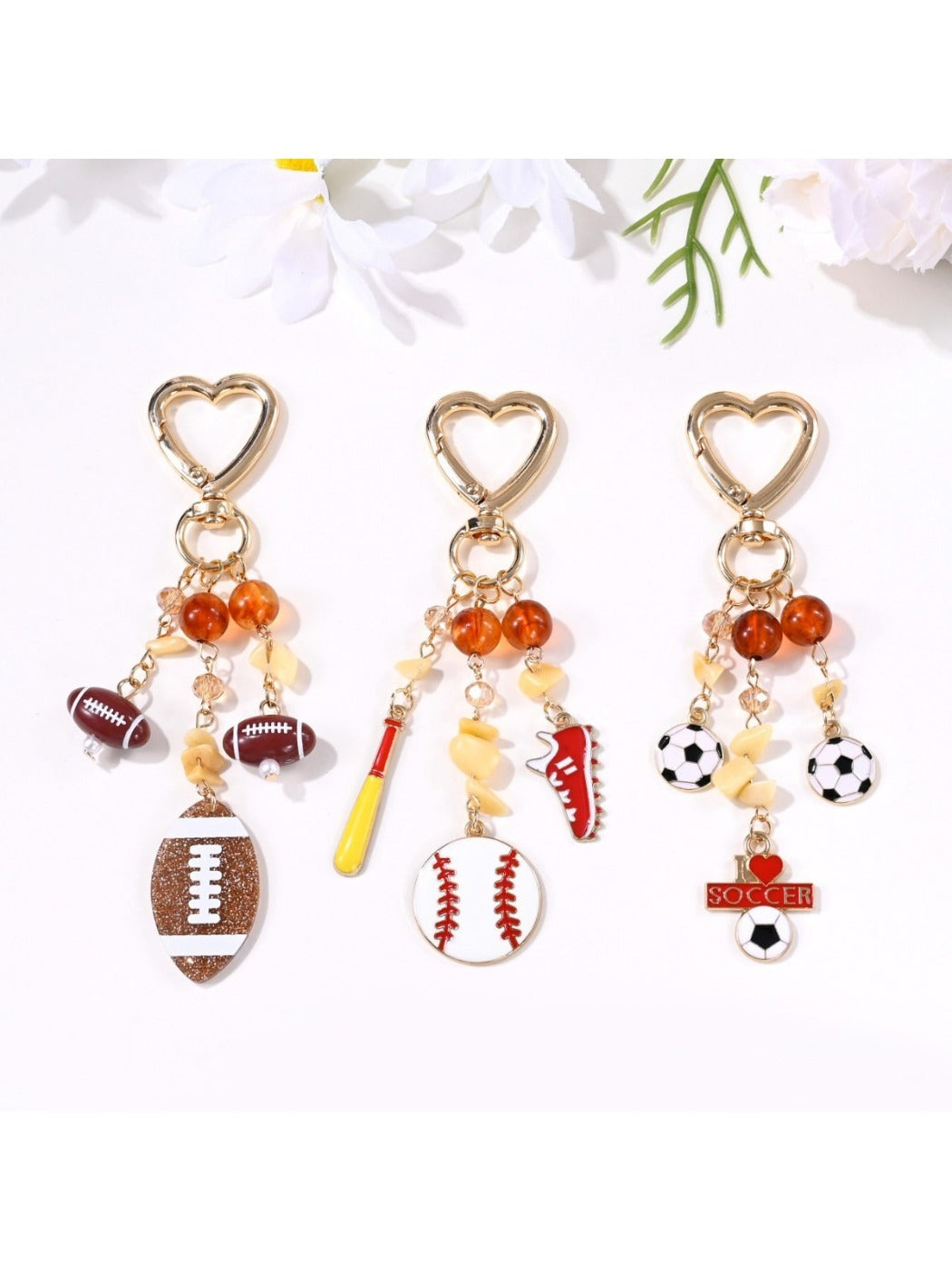 Close-up of a sports ball shaped pendant keychain with detailed stitching