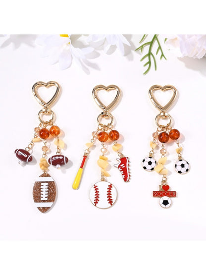 Close-up of a sports ball shaped pendant keychain with detailed stitching