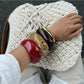 Lovra vintage wide irregular shaped bangle bracelet worn on wrist