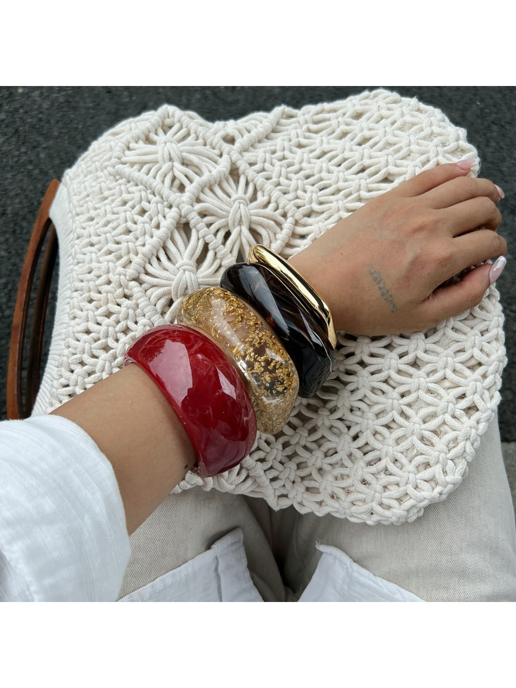 Lovra vintage wide irregular shaped bangle bracelet worn on wrist