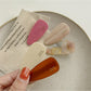 Side view of Beau acetate hair clip highlighting curved design