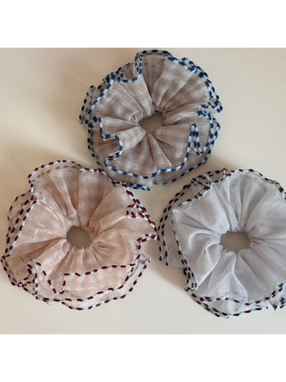 Side view of Gifty color block bound edge tulle scrunchie on a white background