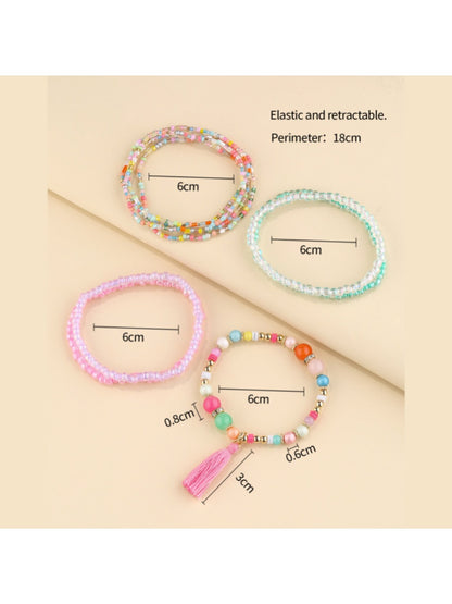 Close-up of Lovra multi strand bracelet showing detailed colorful beads and gold accents
