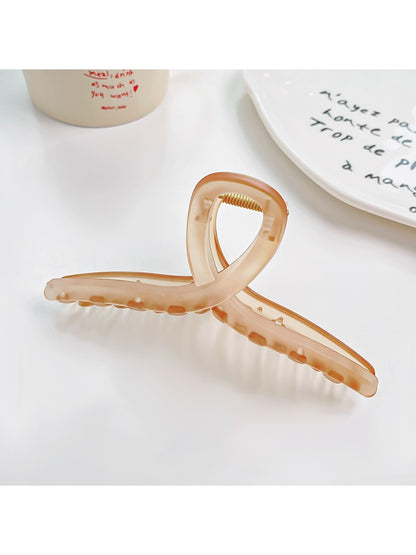 Beau square crisscross hair claw clip in a natural light setting