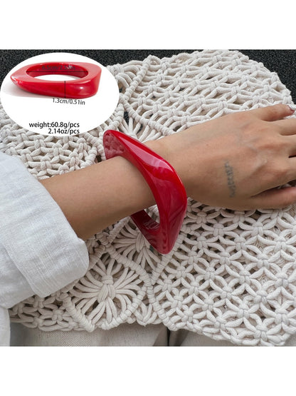 Lovra irregular bangle bracelet styled with other minimalist jewelry pieces