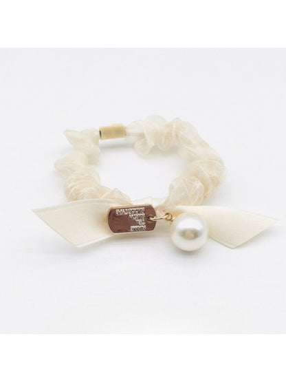 Gifty Sweet Bow Embellished Hair Tie displayed on a white background showing bow details