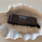 Detailed shot of fabric texture and stitching on Beau vintage bow hair clip