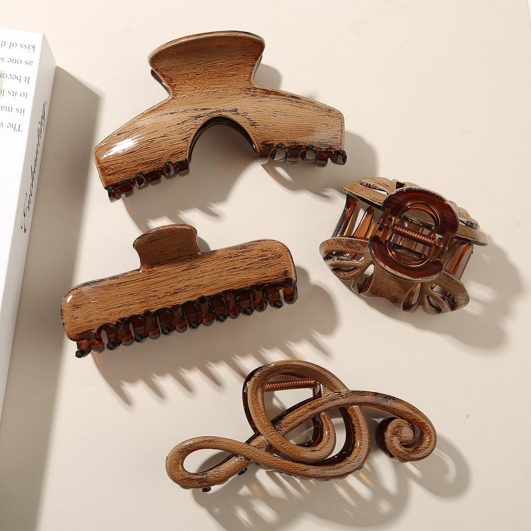 Beau - Glossy PS Curved Hollow Design Claw Clip