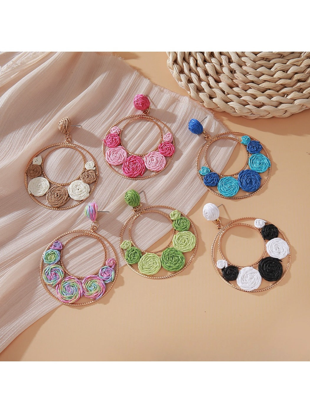 Close-up of Sweet Raffia Circle Stud Earrings with woven raffia texture