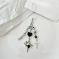 Silver cross keychain displayed in a black gift box with soft lining