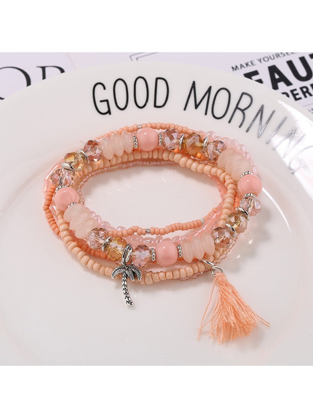 Lovra bracelet styled with casual outfit featuring colorful beads and tassels