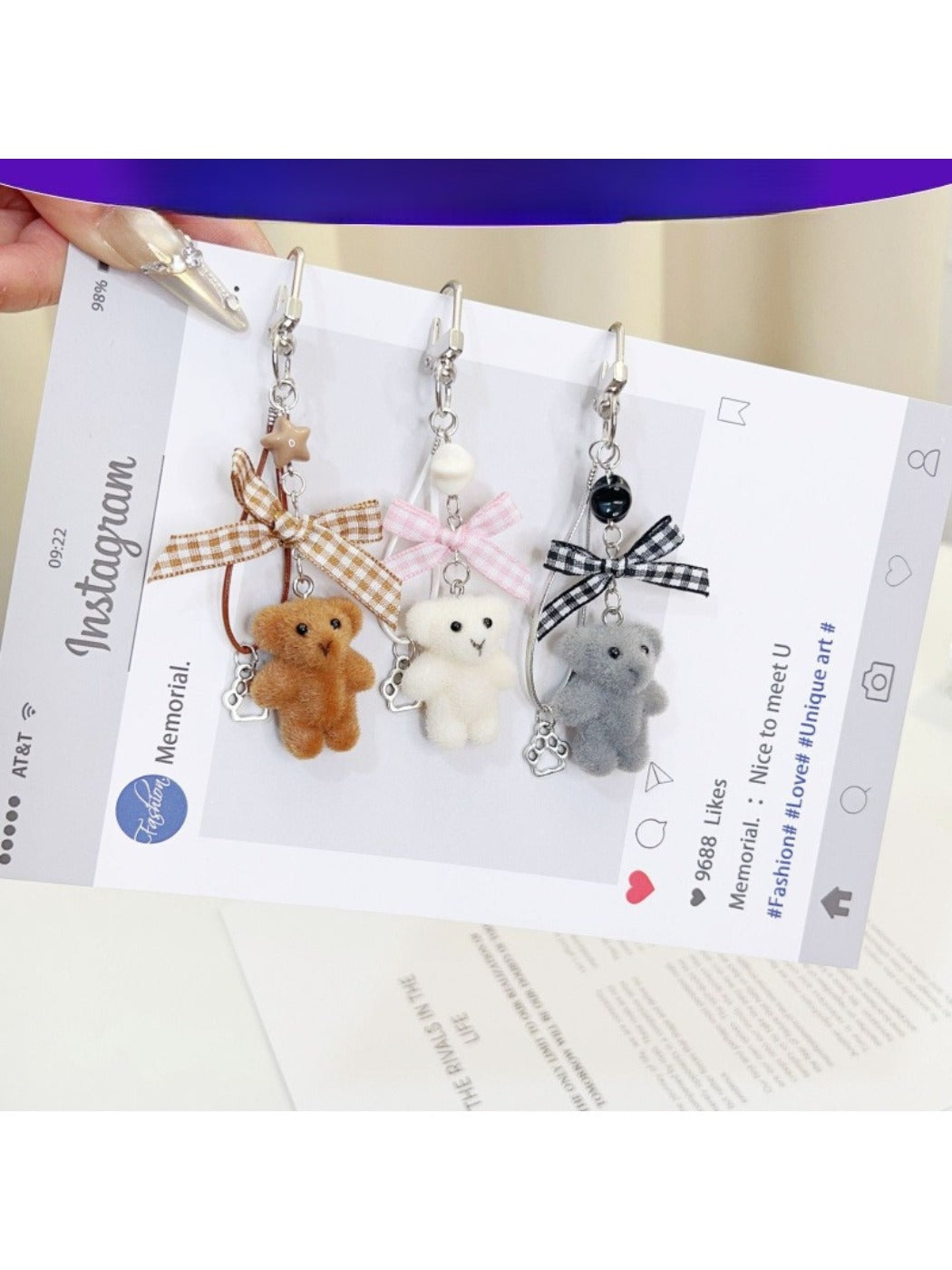 Keypus flocked bear bag charm keychain hanging on a handbag strap