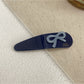 Beau - Bow Embellished Oval Hair Clip