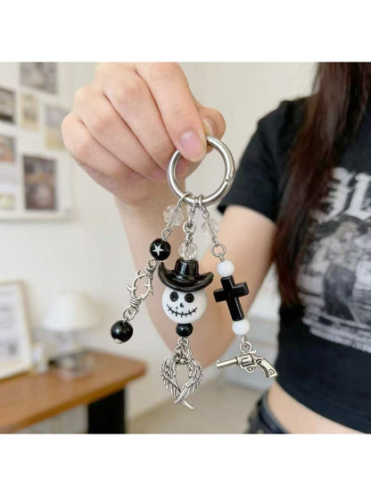 Side view of the minimalist ghost keychain highlighting its slim profile