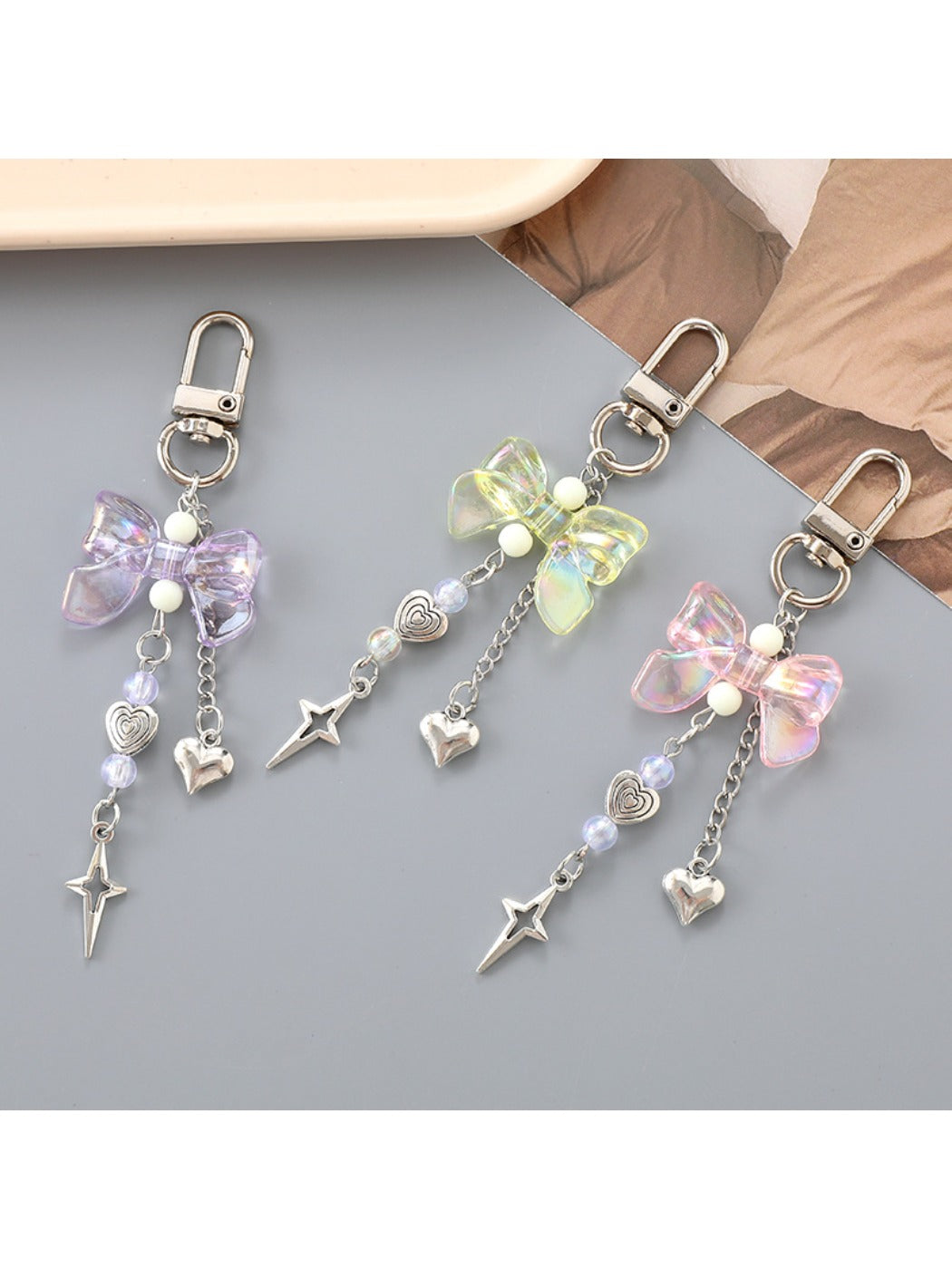Keypus - Heart Shaped Star Pendant Bow Keychain