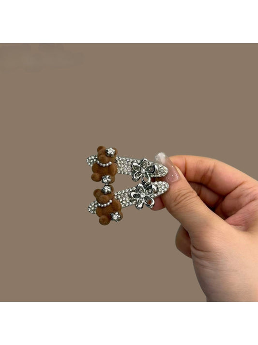 Beau shiny hair clip with a bear pattern on a light background