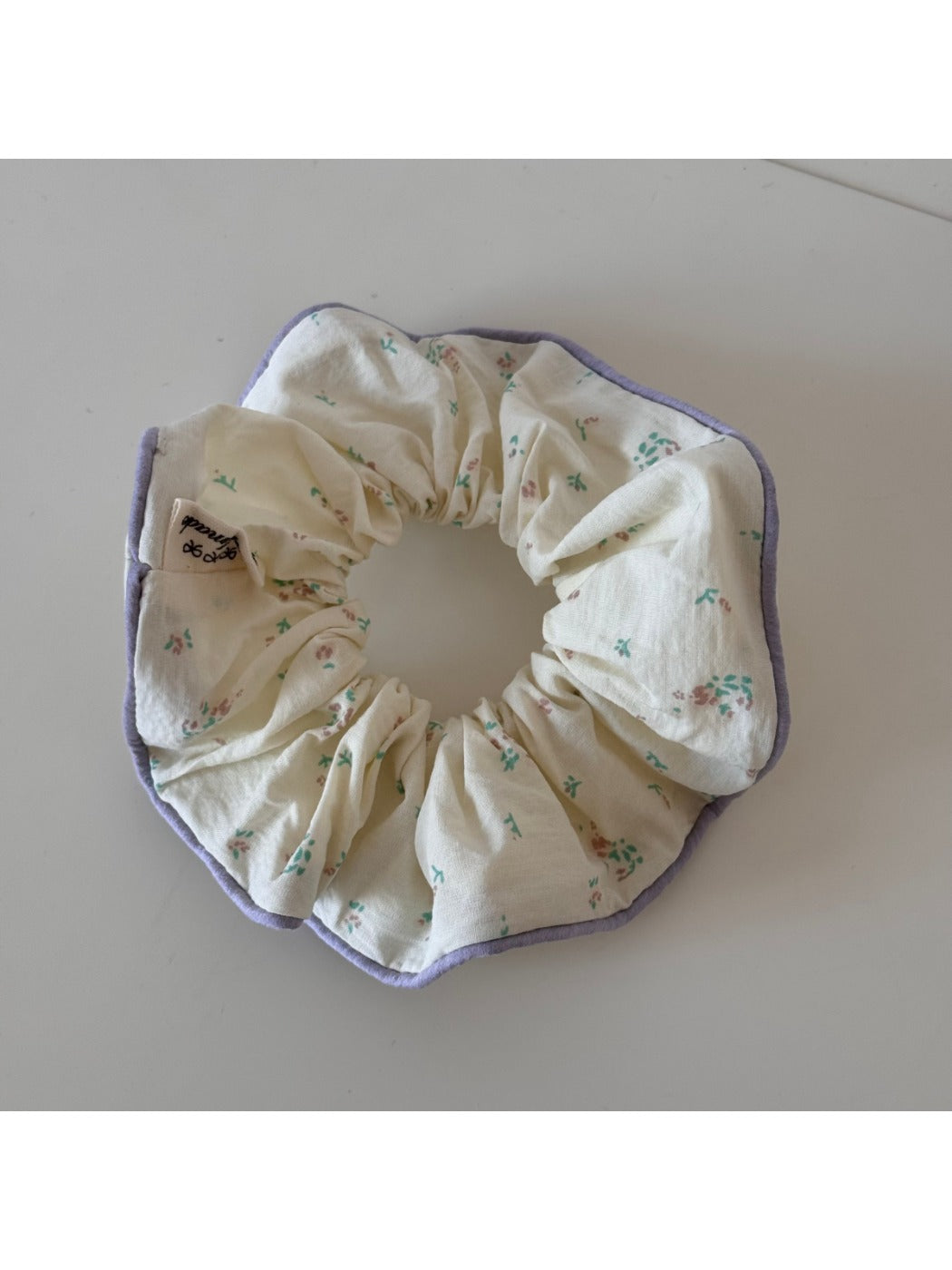 Top view of Gifty checkered bow ribbon scrunchie bow and elastic band