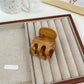 Top view of Beau shark hair claw clip highlighting textured finish