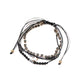 Lovra bracelet worn on wrist with natural light emphasizing bead colors