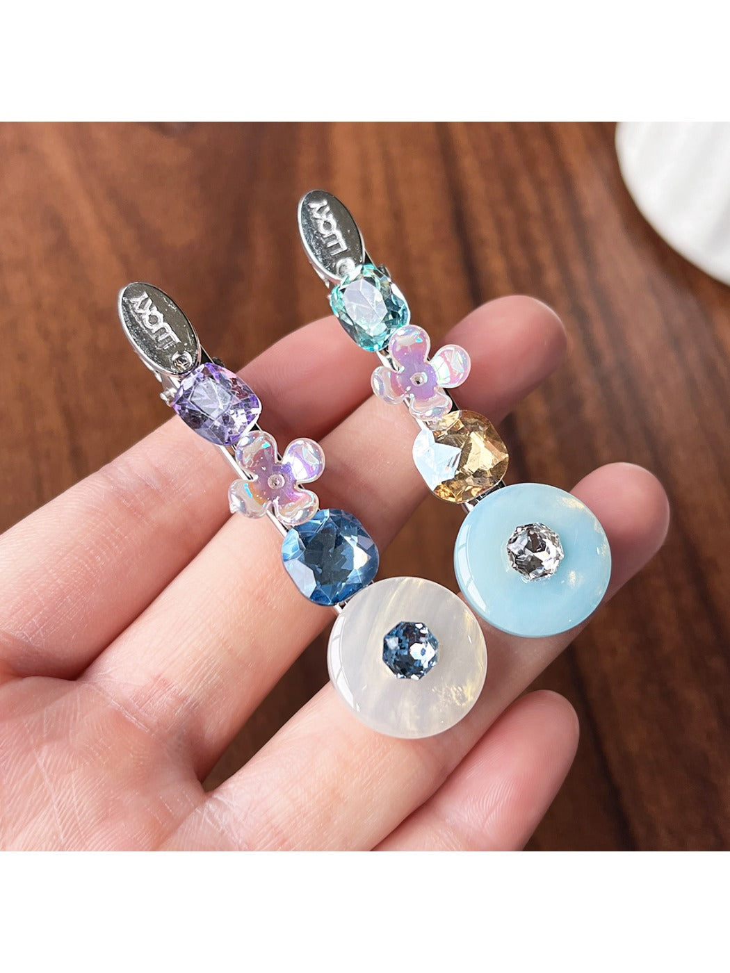 Beau hair clip displayed on white background showing sparkling colorful rhinestones