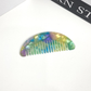 Blue mixed-color pocket comb, front view