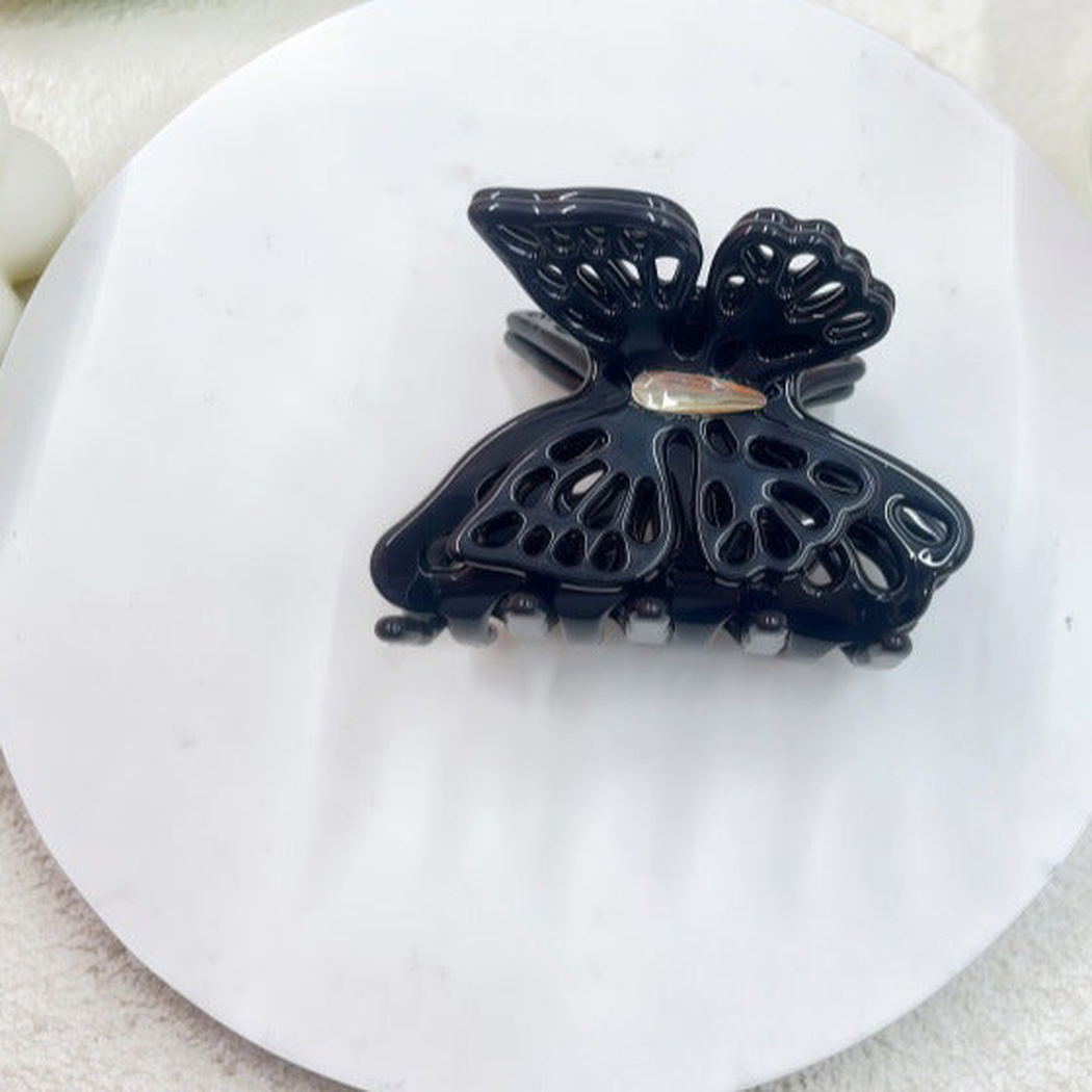 Black butterfly-shaped openwork hair claw clip