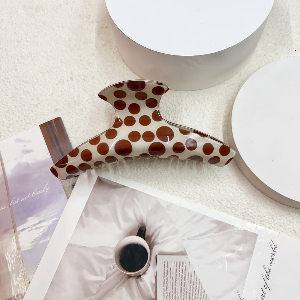 Polka dot hanger-shaped hair claw clip