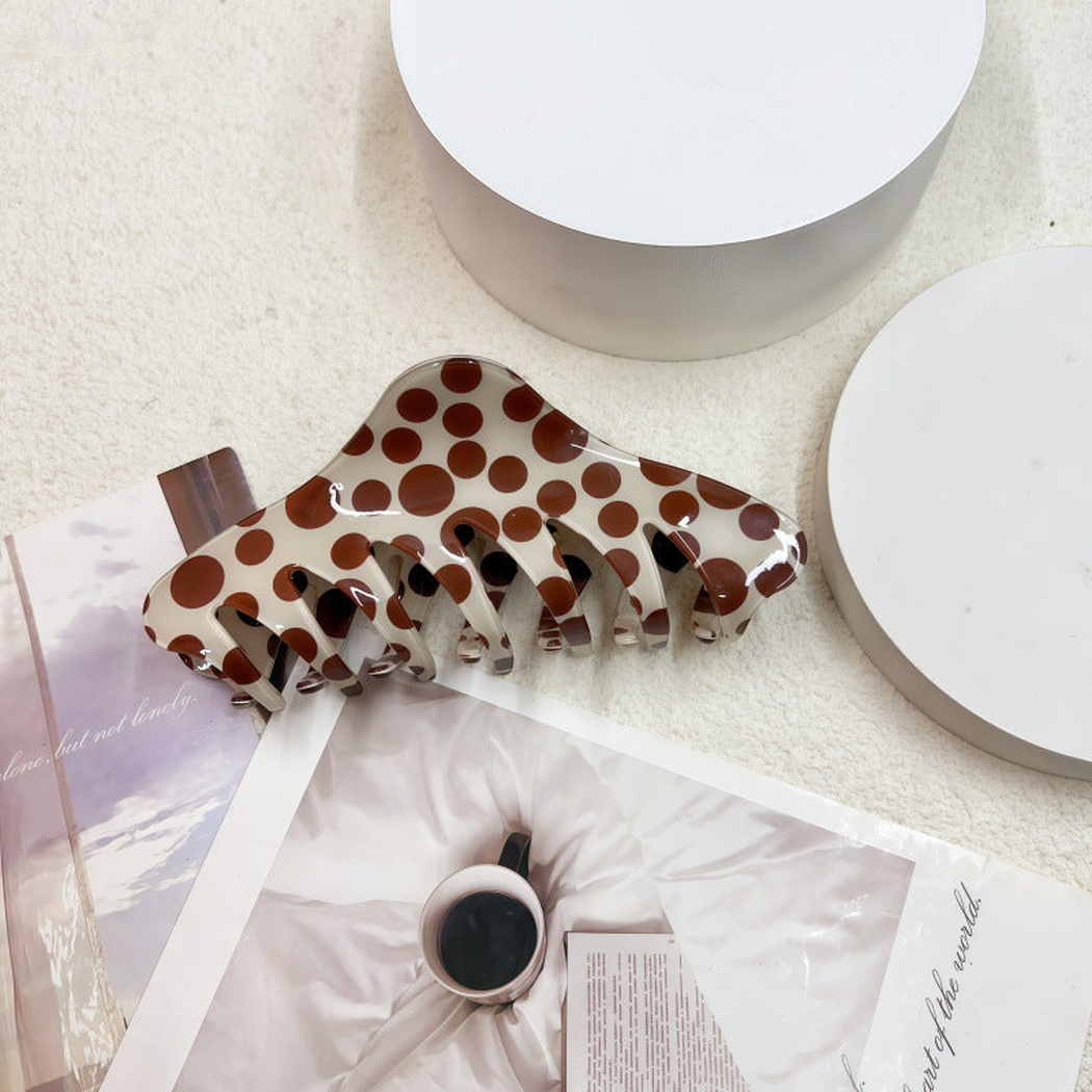 Polka dot spine-shaped hair claw clip