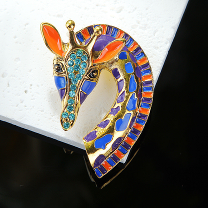 Colorful giraffe brooch on a white display block