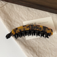Beau - Curved Marbled Banana Hair Clip