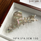Beau - Fishbone Openwork Hair Claw