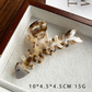 Beau - Fishbone Openwork Hair Claw