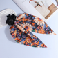 Gifty - Botanical Ribbon-Tail Scrunchie