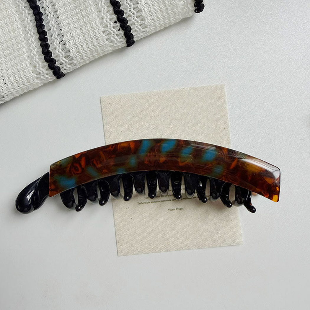 Beau - Elongated Curved Mottled Pattern Banana Clip