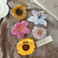 Beau - Flower Silhouette Raised Center Detail Hair Claw