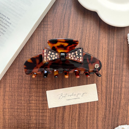 Beau - Studded Bow Motif Mottled Pattern Hair Claw