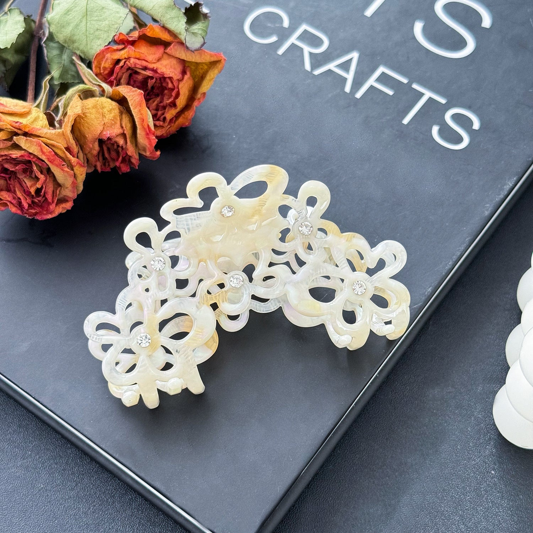 Beau - Openwork Flower Cluster Swirled Pattern Claw Clip