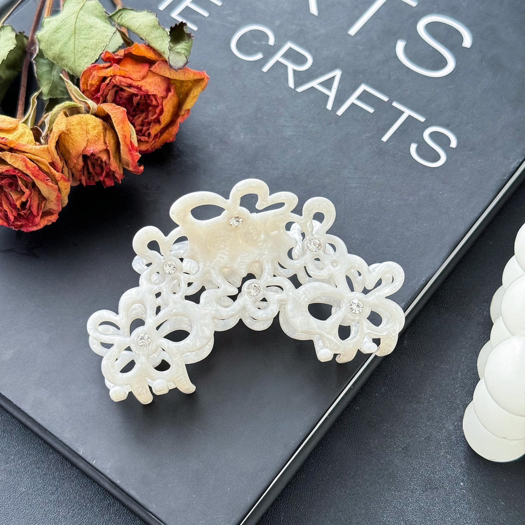 Beau - Openwork Flower Cluster Swirled Pattern Claw Clip