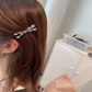 Beau - Crossed-Bow Faceted-Oval Hair Clip