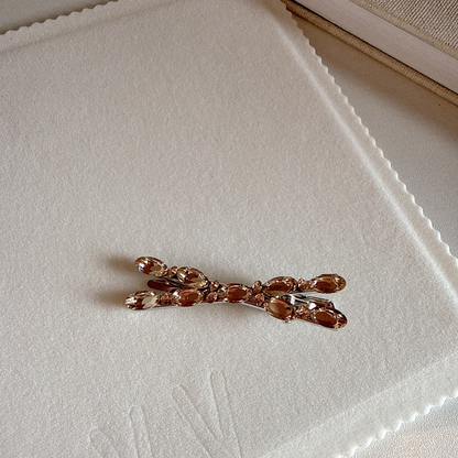 Beau - Crossed-Bow Faceted-Oval Hair Clip