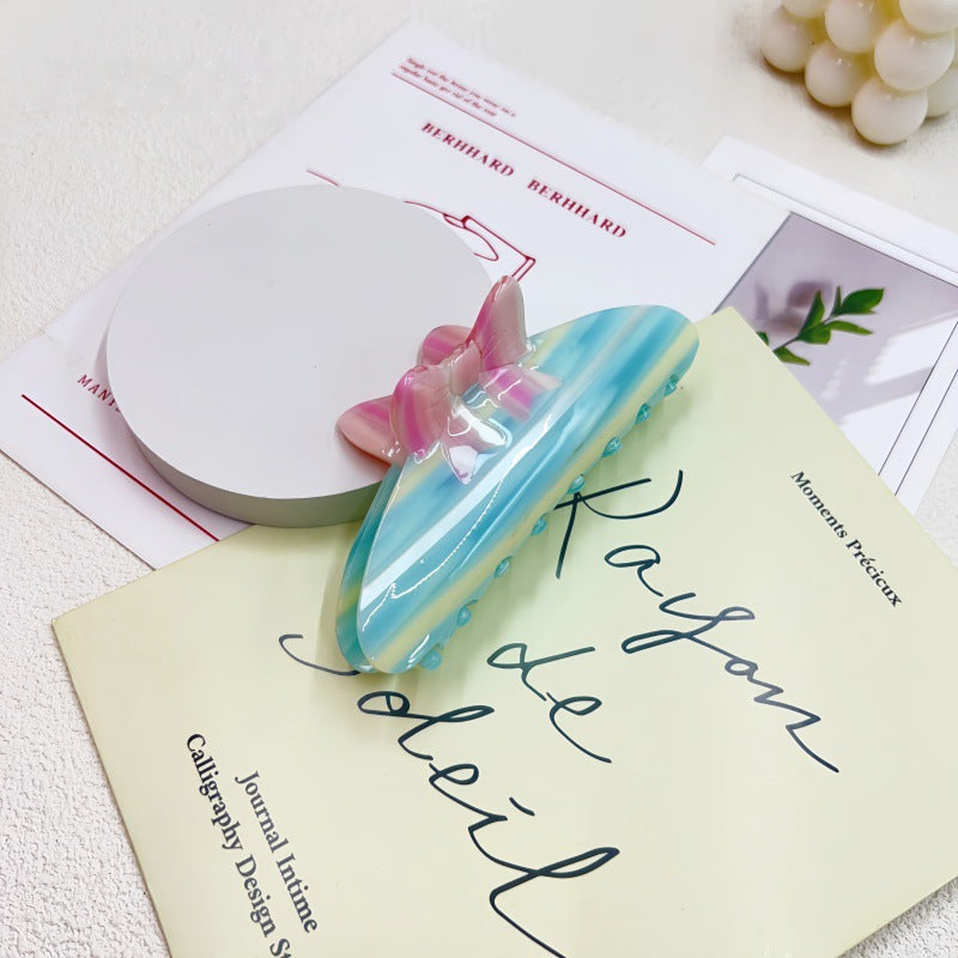 Green striped bow hair claw clip