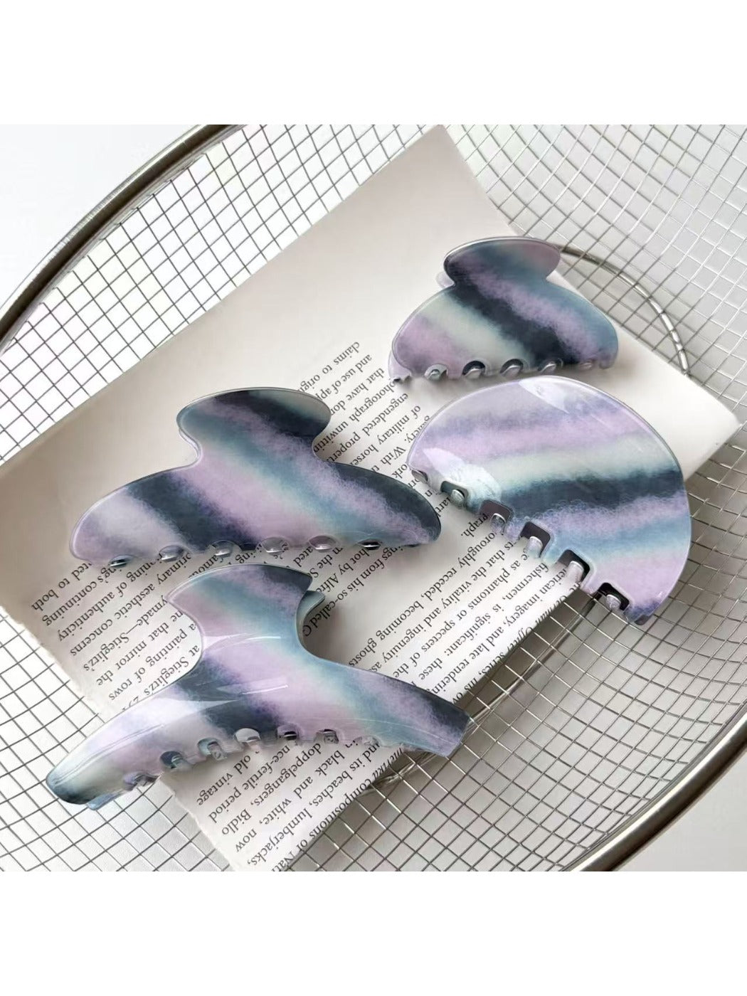 Beau elegant purple toned hair claw clip on white background