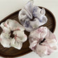 Gifty satin hair scrunchie displayed flat showing smooth fabric and vibrant print