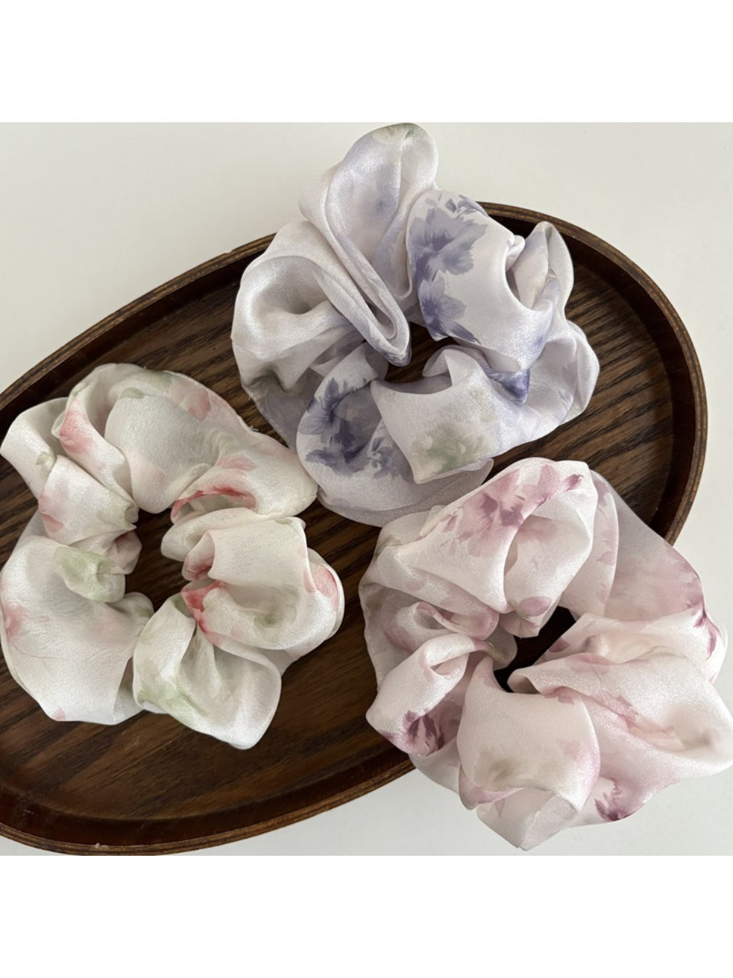 Gifty satin hair scrunchie displayed flat showing smooth fabric and vibrant print
