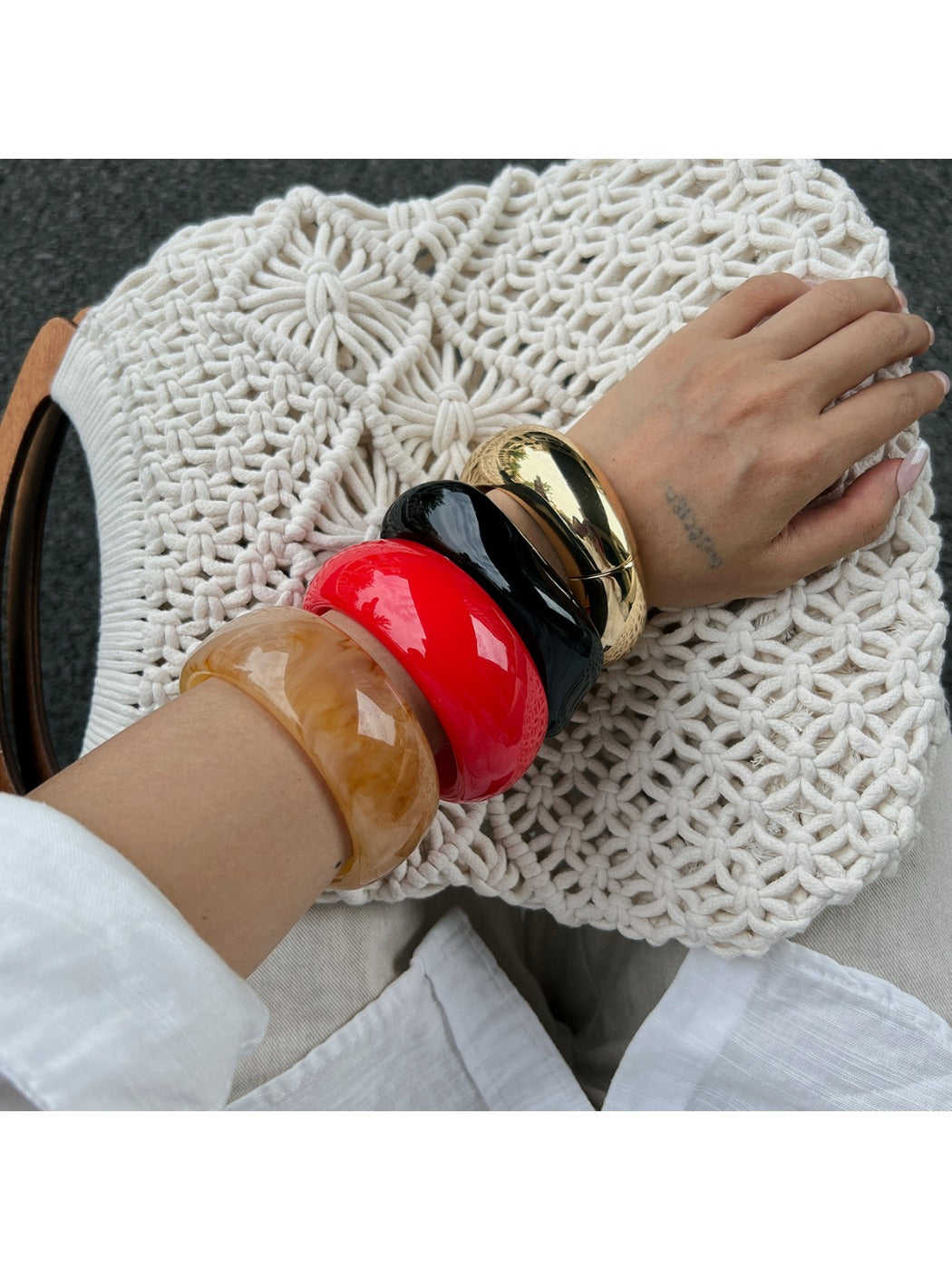 Lovra bracelet worn on wrist highlighting its round geometric pattern