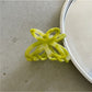 Beau Misty Acetate Butterfly Hair Clip displayed with other hair accessories