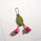 Top view of the tulip keychain highlighting the green stem and leaves